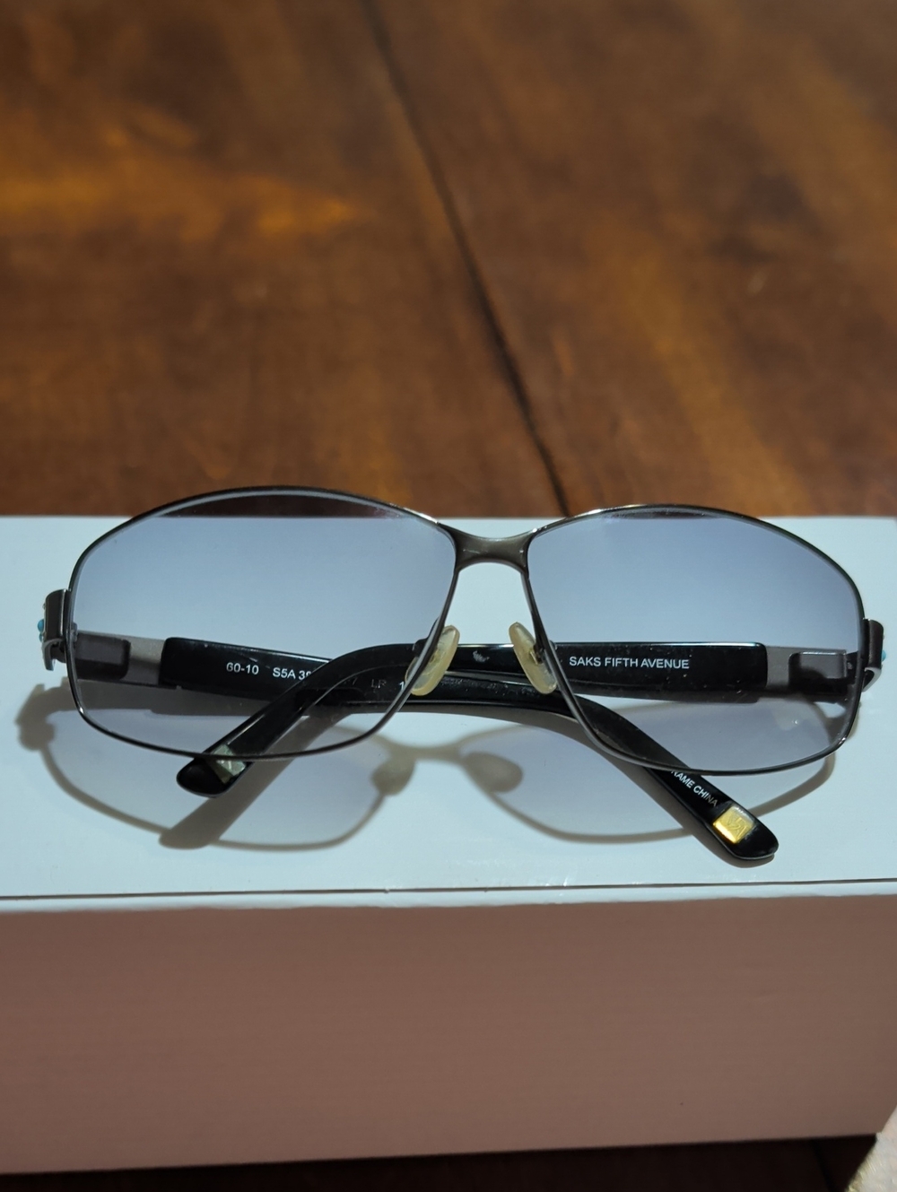 Women's Saks Fifth Avenue Black Metal Frame Sunglasses W Turquoise Color Accents